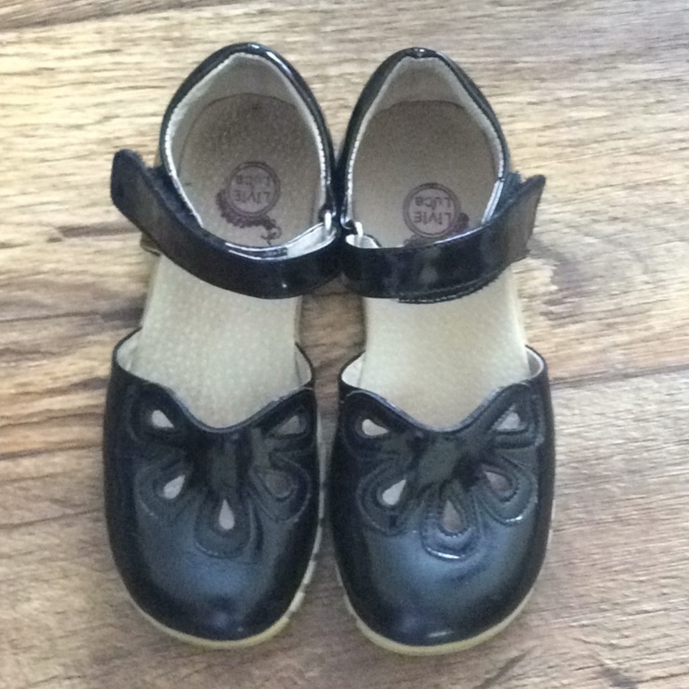 Livie and Luca black leather petals